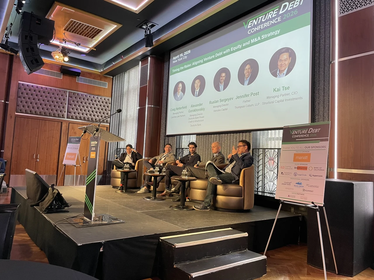 Panelists discussing growth capital on stage at the Venture Debt Conference